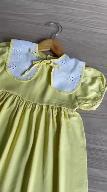 Vídeo de Vestido Dia de Sol Vintage com Gola Boneca
