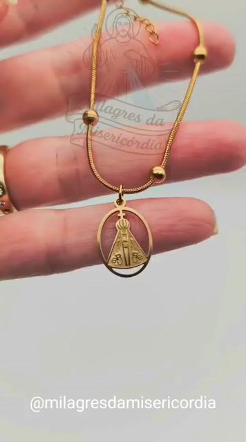 Video de Colar delicado dourado Nossa Senhora Aparecida-medalha oval- Inox