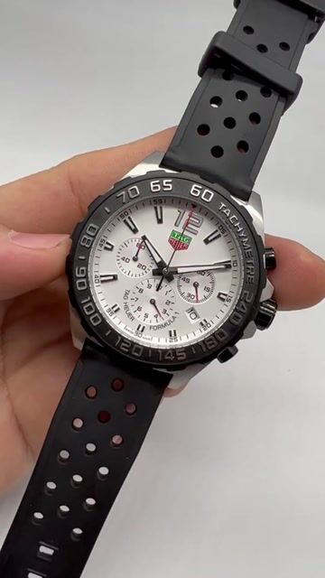 Video de TAG Heuer Fórmula 1 43mm - AÇO/MOSTRADOR BRANCO - SILICONE