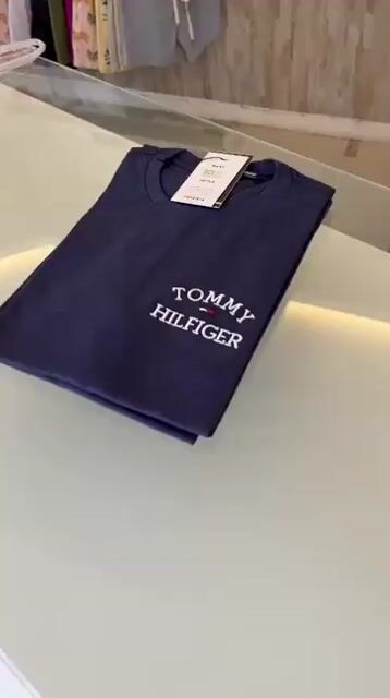 Video de 557 Camiseta Tommy Hilfiger - 100% algodão