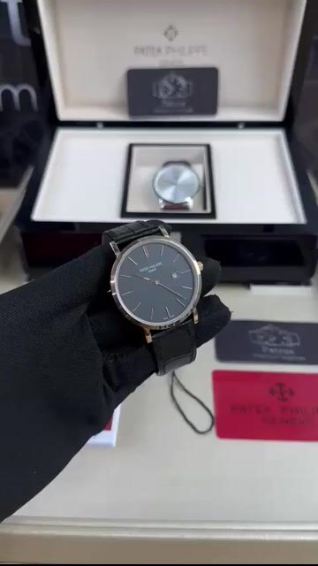 Video de Patek Philippe Slim 40mm - AÇO DOURADO/MOSTRADOR PRETO