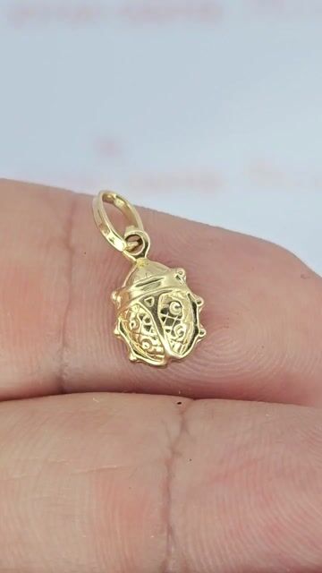 Video de Dije Vaquita San Antonio Oro 18k 0.7 Gr 7x9 Mm Ch - C2386