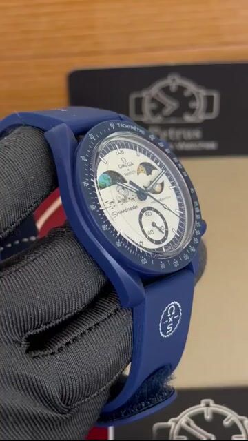 Video de Omega Speedmaster 40mm - RESINA/MOSTRADOR BRANCO COM AZUL- NYLON