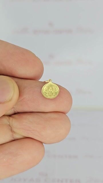 Video de Dije Virgen De Lujan Oro 18k 0.3 Gr Diametro 8 Mm Ch - C2388