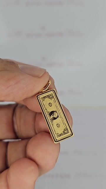 Video de Dije Oro 18k Dólar Doble Faz Italiano 9.6x23 Mm 1.1 Gr C2194
