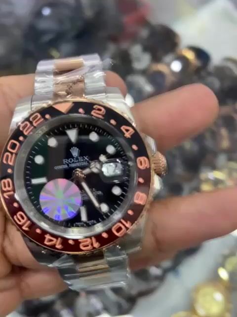 Vídeo de GMT Master II Premium Misto com Mostrador Preto Bezel Misto Preto e Dourado Automático