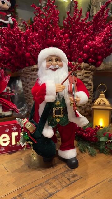 Vídeo de Papai Noel musical violinista 45cm