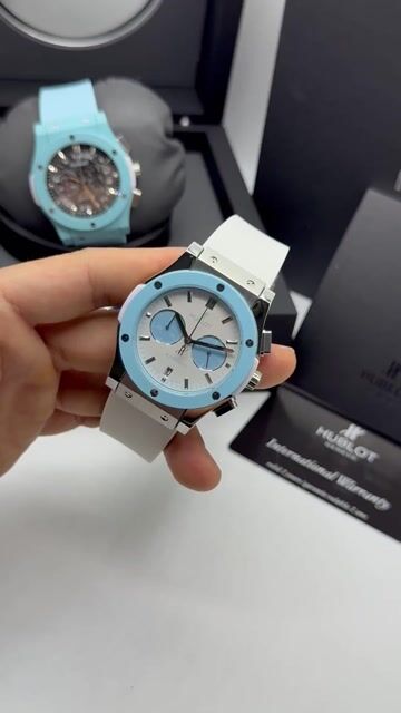 Video de Hublot Classic Chrono 45mm - AÇO/MOSTRADOR BRANCO - SILICONE