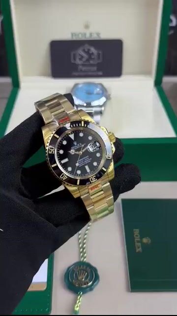 Video de Submariner 40mm - AÇO DOURADO/MOSTRADOR PRETO