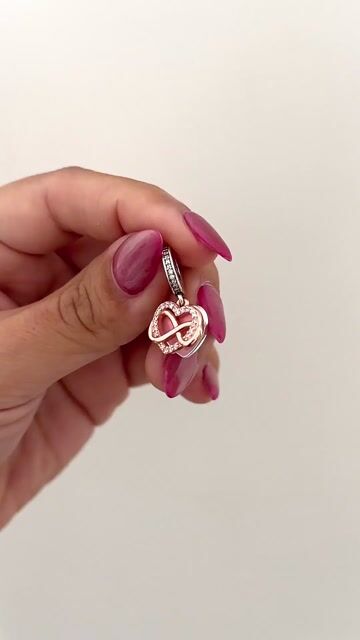 Video de Charm corazón con infinito plata rose