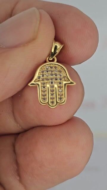 Video de Dije Oro 18k Mano De Fátima Hamsa 12x14 Mm 1.1 Gr Oi-c2195