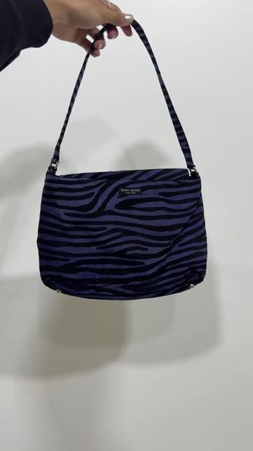 Vídeo de BOLSA ANIMAL PRINT KATE SPADE •