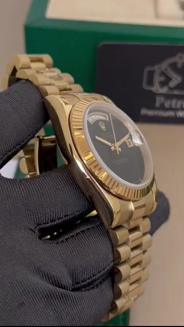 Video de Day-Date President 40mm - AÇO DOURADO/MOSTRADOR PRETO