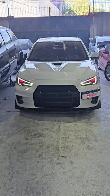 Vídeo de Body Kit Lancer Varis - Parachoque Dianteiro e Traseiro, Paralamas, Capo Varis + Aerofólio GT - Sem Pintura