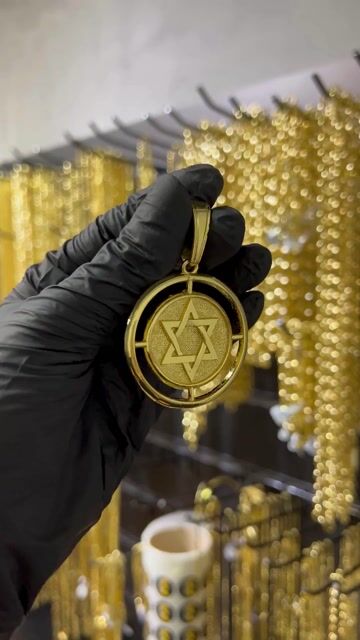 Vídeo de Pingente Estrela De Davi Redondo Vazado G Banhado A Ouro 18K