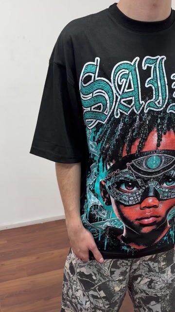Video de Remera Over Saint niño ojo green