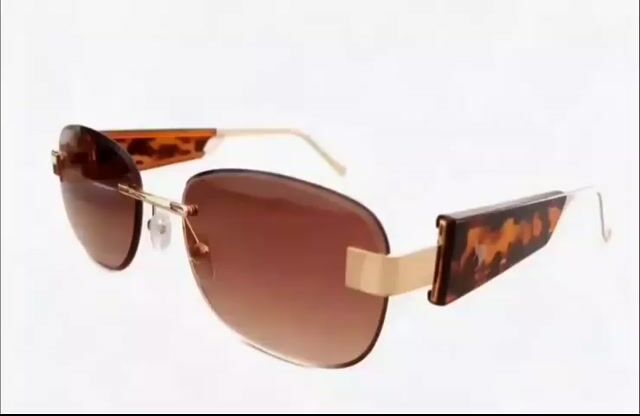 Video de Óculos Kanguru Glasses Casual Luxo Retrô. Haste em Acetato Animalle e Metal Dourado. Lente Marrom Claro.