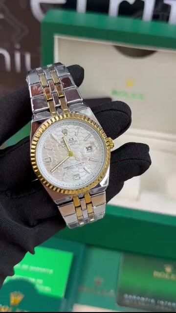 Video de Land Dweller 38mm - AÇO COM DOURADO/MOSTRADOR BRANCO