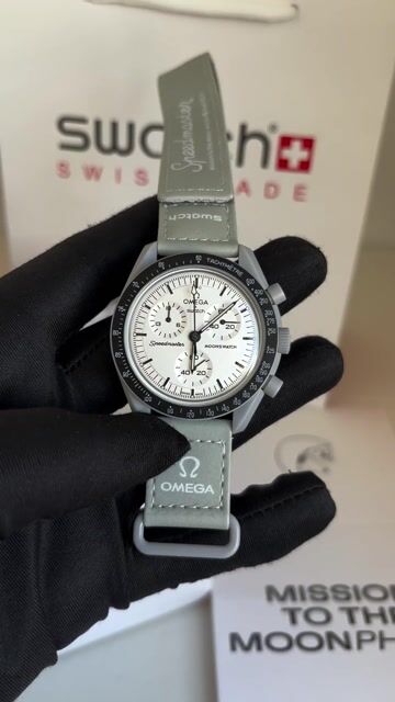 Vídeo de Relogio Omega Swatch Cinza Branco Bioceramic MoonSwatch 1965 (REF. S033M106)