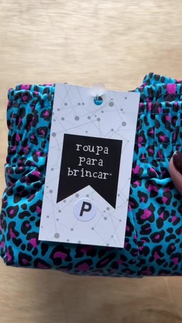 Video de Short Saia Infantil Estampado Onça Neon